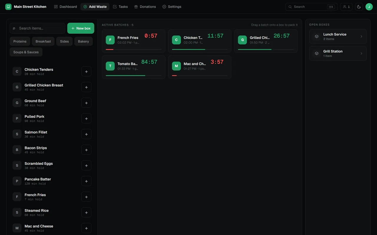 RMS Add Waste board with the menu item rail, open batches with holding timers, and boxes to drop them into
